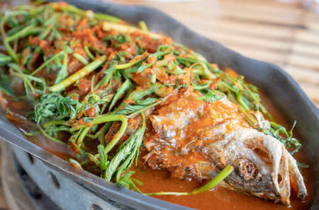 Sour soup made of tamarind paste with fishの写真素材