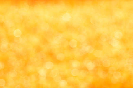 bokeh Backgrounds color orange gold ,Orange and white blur defocused nature blurredの写真素材