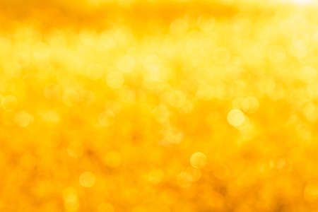 bokeh Backgrounds color orange gold ,Orange and white blur defocused nature blurredの写真素材