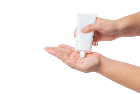 Asian girl , Cleaning hands by liquid alcohol, to prevent germs on a white background ,Washing hand with Alcohol Sanitizer ,clipping pathの写真素材