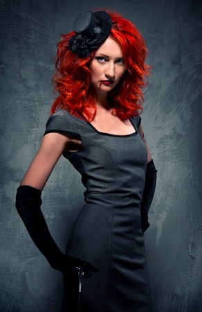 Gorgeous redhead woman with blood on her lipsの写真素材