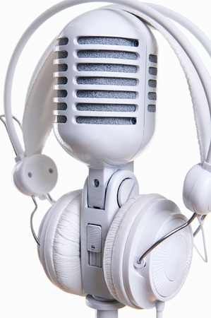 White microphone and headphones over white backgroundの写真素材