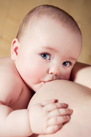 Mother breast feeding her infant の写真素材