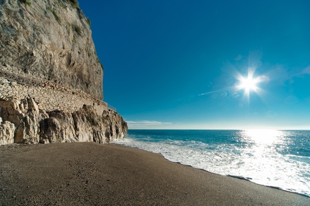 Beautiful sunny day landscape,blue sea and old wall の写真素材