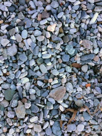 Pebble stones background close-upの写真素材