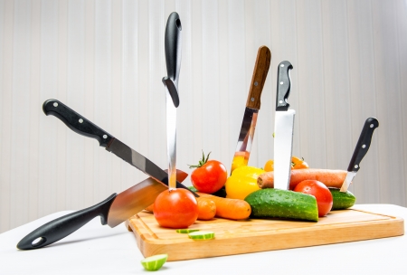 Vegetables and knifes, weight loss conceptの写真素材