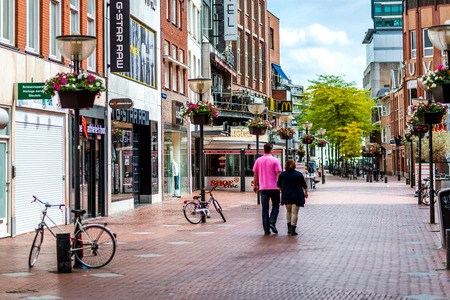 Eindhoven, Netherlands - May 24, 2015: People walking in the Eindhoven main commercial street. It is one of the most famous shopping street in the city, a narrow but long street with plenty of stores, bars and clubsのeditorial素材