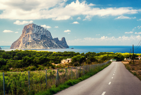 Road to the Cala d'Hort beach. Cala d'Hort is a small, beloved beach with a fantastic view of the mysterious island of Es Vedra. Ibiza, Balearic Islands. Spainの写真素材