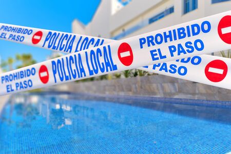Quarantined public area, swimming pool closed caused by pandemic disease situation. Quarantine globally spread infection. Stop COVID-19 coronavirus line restricted areas, no entry conceptの写真素材
