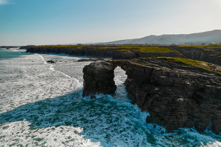 Above view to the empty Praia das Catedrais or Beach of Cathedrals located on northwest coast of...