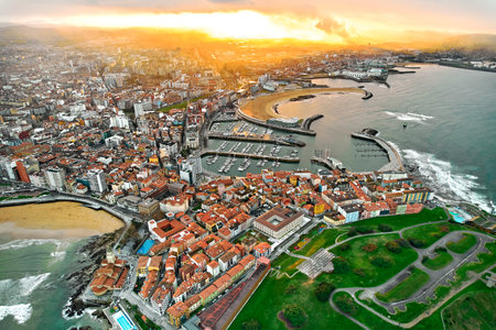 Drone point of view Gijon or Xixon city in north-western Spain during sunset, coast of Cantabrian Se, Bay of Biscay, in the central-northern part of Asturias. Travel destinations, landmarks conceptの写真素材