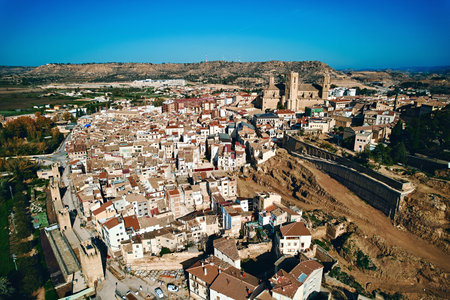 Aerial shot of Castle of the Calatravos or Castillo de los Calatravos located on hill top in the ancient town of Alcaniz, Teruel. Spainの写真素材