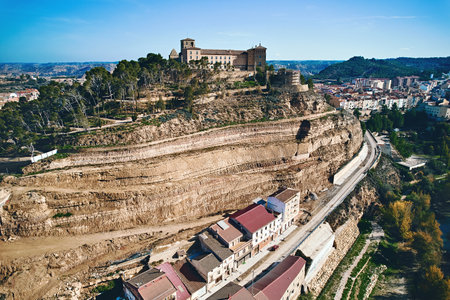 Aerial shot of Castle of the Calatravos or Castillo de los Calatravos located on hill top in the ancient town of Alcaniz, Teruel. Spainの写真素材