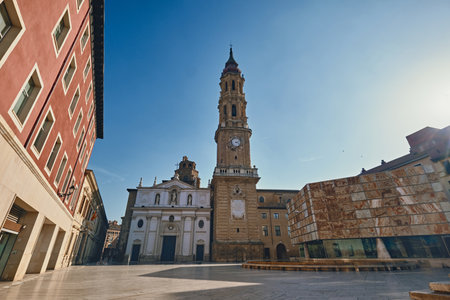 Ancient architecture with bell tower located in square of Zaragoza city, Spainの写真素材