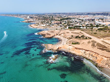 Rocky coastline of Playa Flamencaの写真素材