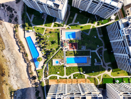 Aerial view of Punta Prima coastline with modern high-rise residential building. Costa Blanca, Alicante province. Spainの写真素材