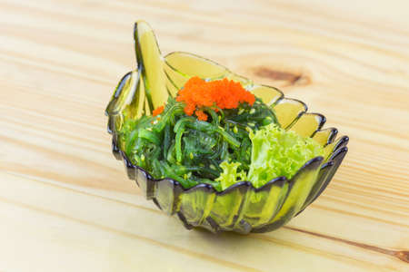 Wakame seaweed salad with sesame seed. Traditional Japanese food. Top view.の写真素材