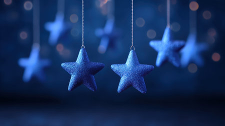 A captivating image of glimmering blue stars suspended gracefully against a dreamy bokeh backdrop. The soft light effects create a magical ambiance, perfect for festive themes or serene environments.の素材