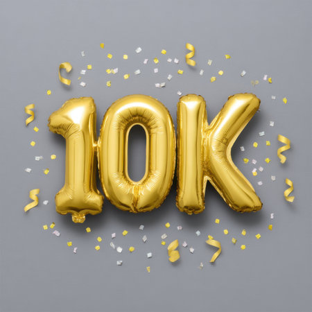 Vibrant golden balloons displaying the number 10K are surrounded by colorful confetti and ribbons, perfect for celebrating milestones and achievements.の素材