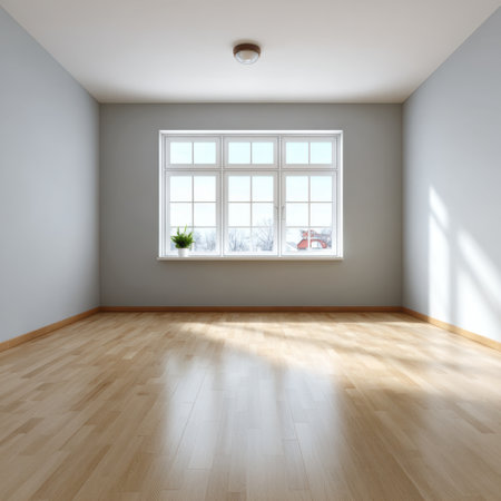 This image features a bright and spacious empty room with large windows allowing ample natural light. The wooden floor complements the minimalist design, creating a calming and inviting atmosphere ideal for various uses.の素材