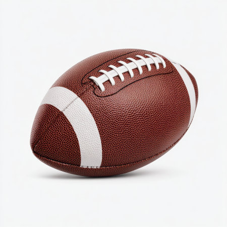 This image features a classic American football placed against a clean background. It symbolizes sportsmanship, teamwork, and athlete spirit for various applications.の素材