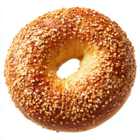 A freshly baked bagel topped with sesame seeds, showcasing a golden crust and inviting aroma, perfect for any meal or snack.の素材