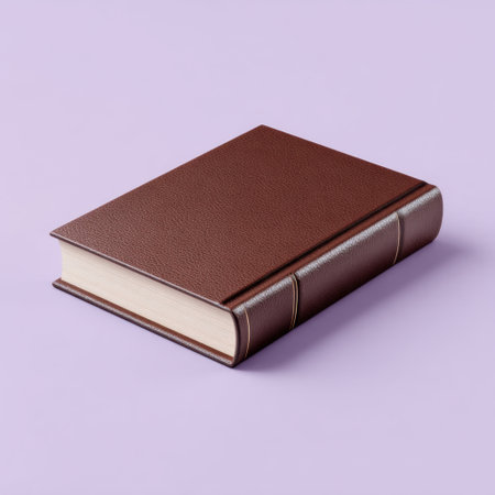 A brown leather-bound book sits on a soft light purple surface, ideal for displays in educational, artistic, or creative contexts. Perfect for various projects.の素材