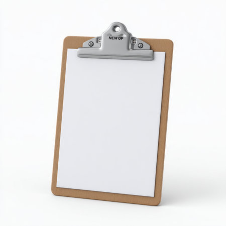 A sleek, blank clipboard with a metal clip stands against a plain white background, perfect for office tasks, educational uses, or creative projects.の素材