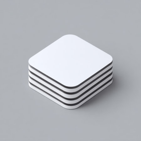 This image features a neatly stacked arrangement of four square coasters in a minimalist style, perfect for enhancing modern interior aesthetics. Ideal for home styling.の素材