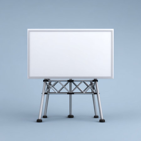 This image features a blank canvas on a metallic stand in a minimalist studio setting, perfect for presentations, advertising, or creative projects.の素材