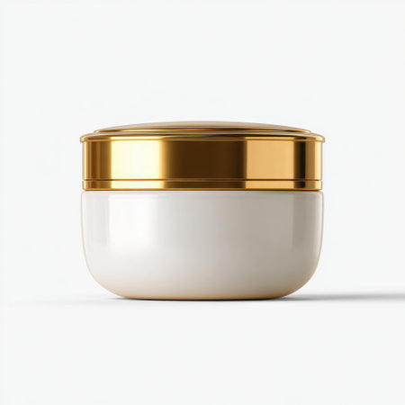 This image showcases an elegant white cosmetic jar with a gold lid, perfect for skincare products. Ideal for branding and marketing in a minimalist style.の素材