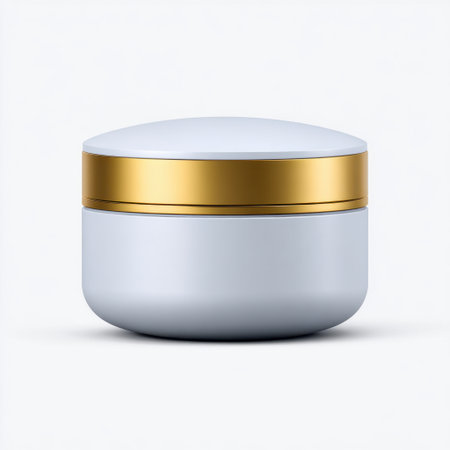 This image features an elegant cosmetic jar in white with a striking golden lid, perfect for showcasing various skincare products in a clean, modern style.の素材
