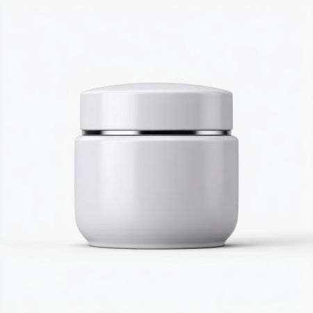 A minimalistic white cream jar sits on a clean background, ideal for showcasing skincare products. This elegant container emphasizes modern design and simplicity.の素材