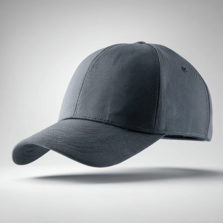 This image features a stylish gray cap floating gracefully against a soft gray background, perfect for showcasing fashion and apparel designs.の素材