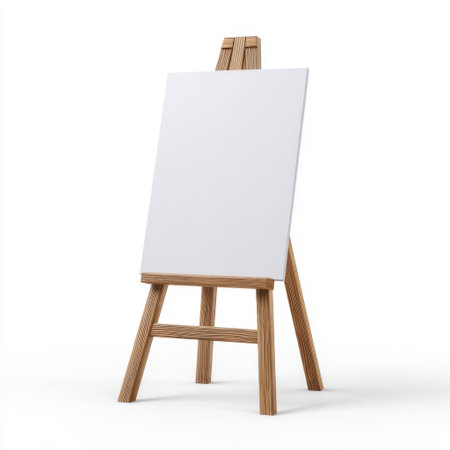 A blank easel stand with a clean white canvas evokes a sense of creativity and potential for artistic expression in any setting. Ideal for studio use.の素材