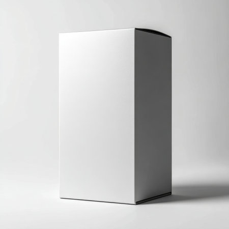 A sleek, minimalist white package box stands on a plain background, ideal for creative presentations, branding, and product mockups. Perfect for showcasing design.の素材