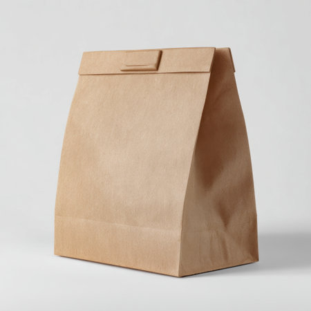 This brown kraft paper bag features a minimalist design, suitable for various uses including food packaging, gifts, and eco-friendly shopping options.の素材