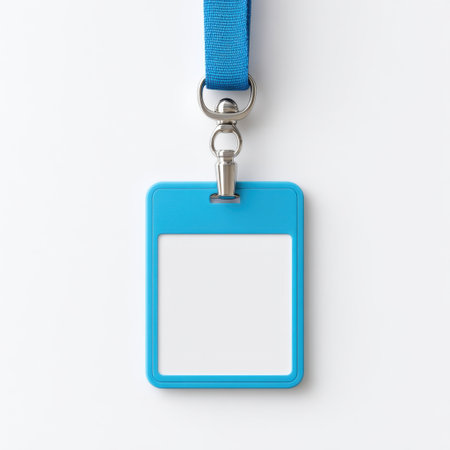 A blank blue name tag with a lanyard, perfect for identification purposes in various settings like meetings, events, or casual gatherings. Its simple design allows for easy customization.の素材