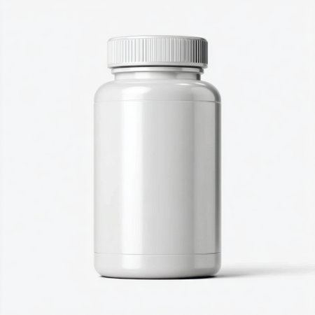 A blank white plastic bottle for pills or supplements featuring a secure screw-on lid, perfect for use in pharmacy, health, or marketing visuals.の素材