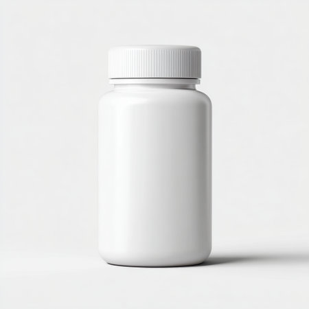 A plain white bottle with a fitted lid set against a light background, ideal for showcasing pharmaceutical, nutritional, or cosmetic products. Perfect for mockups.の素材