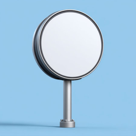 A minimalist round sign post stands alone with a clear surface against a light blue background, perfect for blank advertising or message display.の素材