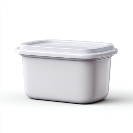 This image features a white plastic container with a lid, ideal for food storage, sitting on a clean surface with soft lighting for an appealing look.の素材