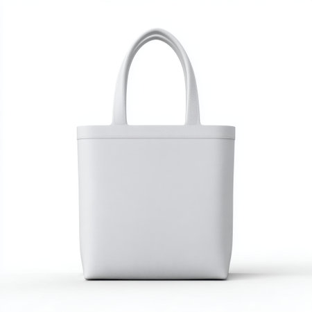 This minimalist white tote bag features a sleek design against a clean background, ideal for fashion and lifestyle imagery showcasing simplicity and elegance.の素材