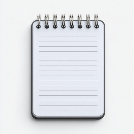 A blank spiral notepad featuring empty lined pages ready for writing notes, lists, and ideas. Ideal for creative projects and organization tasks.の素材