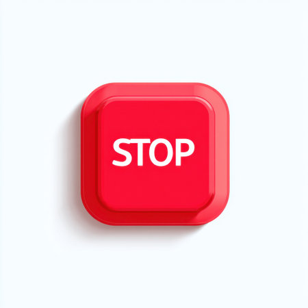 A vibrant red stop button with white text against a clean white background, ideal for projects focusing on traffic safety, alerts, and communication.の素材