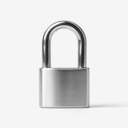 A sleek, silver metal padlock rests on a clean white background, symbolizing security, protection, and reliability in various contexts.の素材