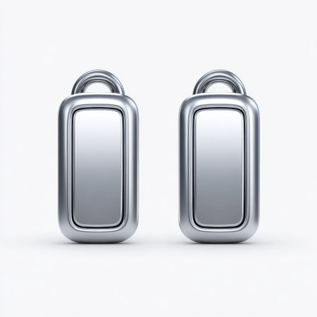 This image showcases a pair of sleek metallic tags that reflect light beautifully. Ideal for personalizing or labeling, it offers a modern and minimalist aesthetic, perfect for various creative projects.の素材