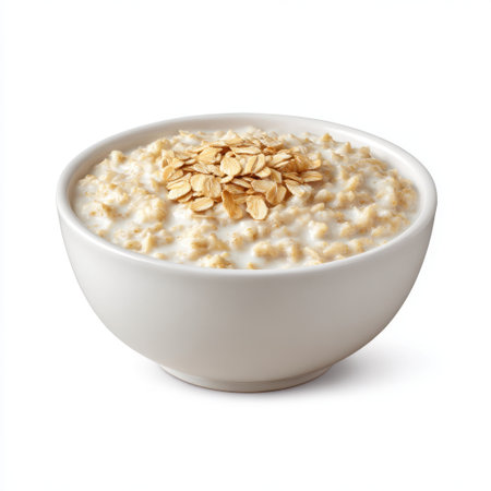 A creamy bowl of oatmeal topped with crunchy oats, perfect for a nutritious breakfast. Ideal for promoting healthy eating, simplicity, and comfort.の素材