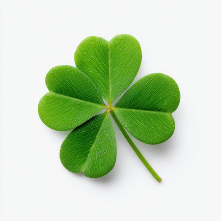 A bright four-leaf clover set against a pure white background, representing good fortune and the beauty of nature. Ideal for wellness and nature themes.の素材