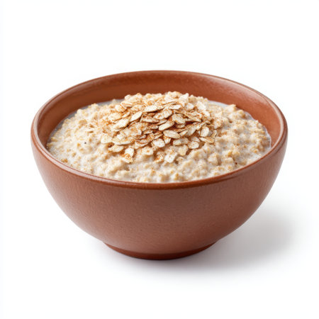 A creamy bowl of oatmeal topped with oat flakes creates a warm and inviting breakfast option, ideal for a nutritious and wholesome start to the day.の素材